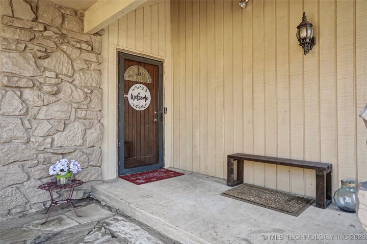 Property Photo:  8319 E 107th Place S  OK 74133 