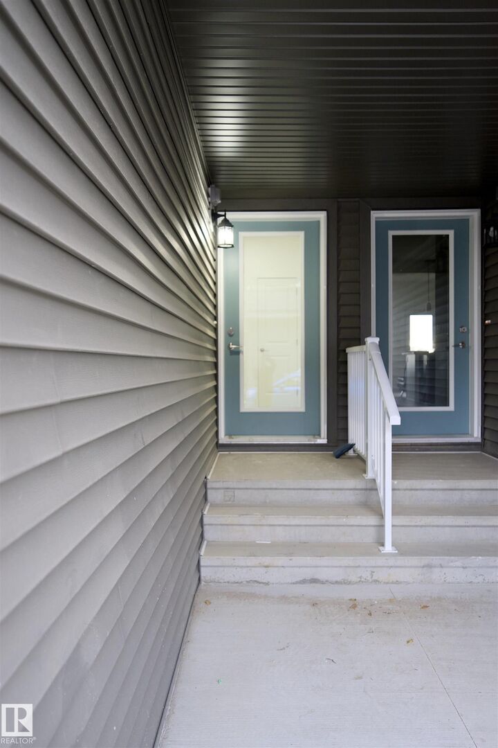 Property Photo:  2710 66 Street SW 12  AB T6X 1A3 