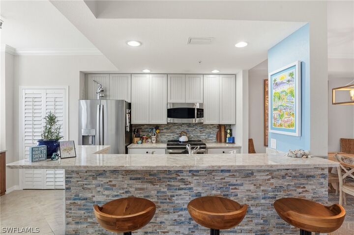 Property Photo:  9715 Acqua Court 113  FL 34113 