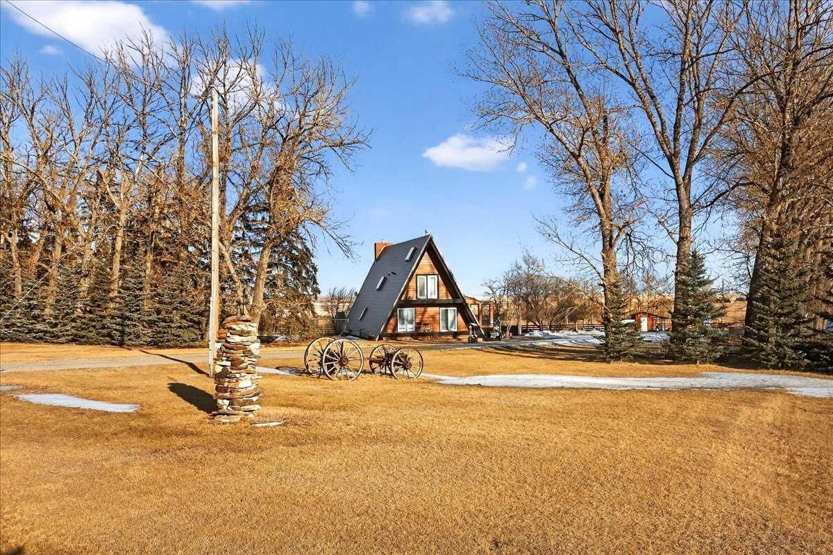 Property Photo: 241037 Rge Rd 241 AB T1P 2C3