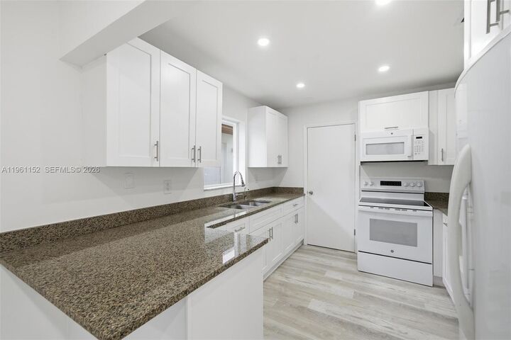 Property Photo: 1281 W 42nd St 1 FL 33012