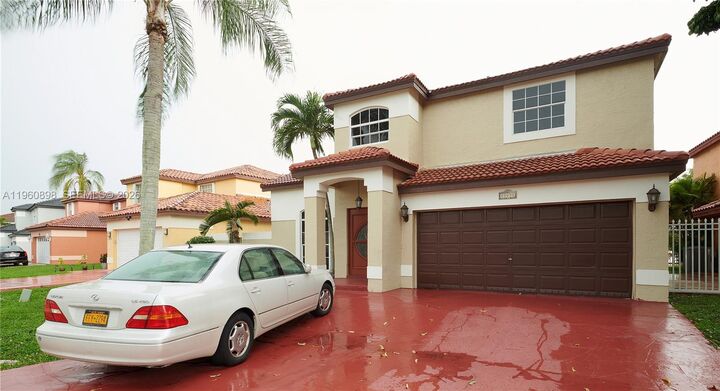 Property Photo:  20030 NW 83rd Ct  FL 33015 