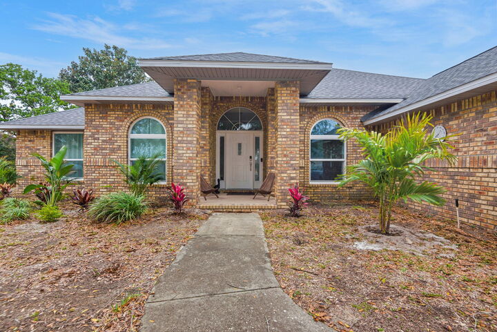Property Photo:  5043 Challenger Way  FL 32507 