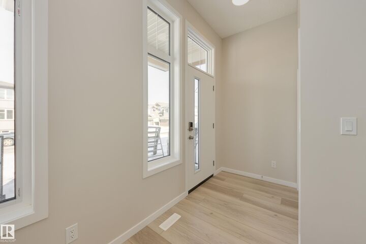 Property Photo:  21111 25 Avenue NW  AB T6M 3H1 