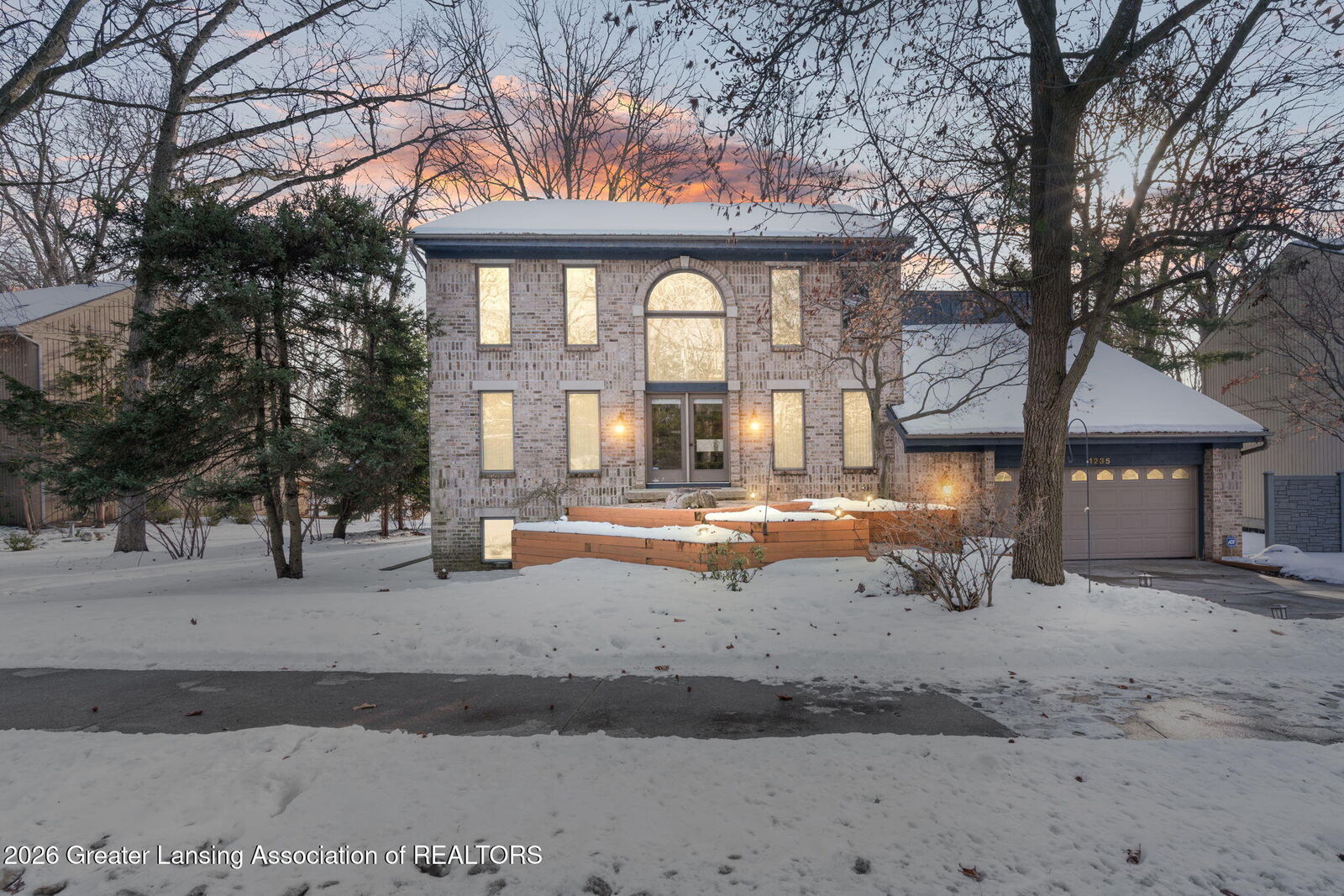 Property Photo:  1235 Woodwind Trail  MI 48840 