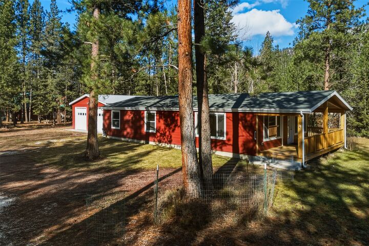 Property Photo:  14200 Turah Road  MT 59825 