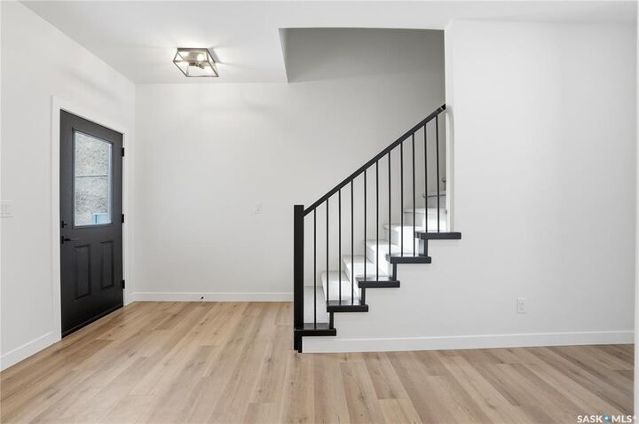 Photo de la propriété:  211 Sharma Lane  SK S7W 1K7 