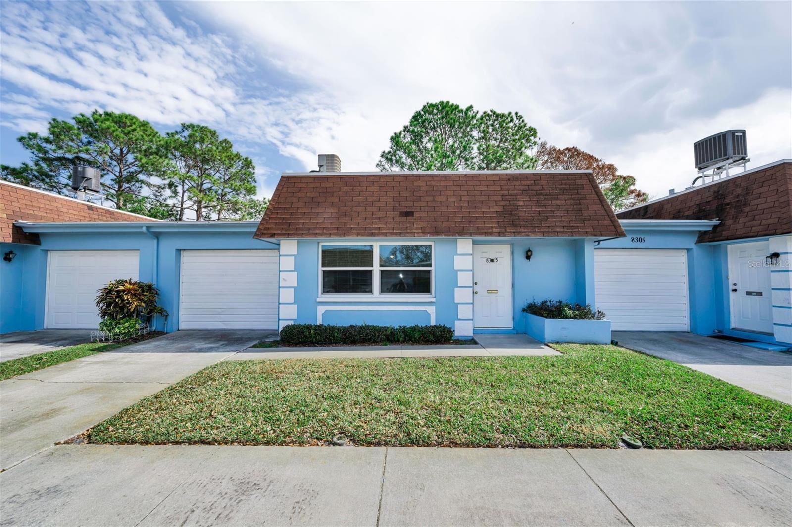 Property Photo:  8315 Burgundy Drive N 8315  FL 33781 