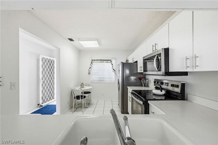 Property Photo:  7760 Emerald Circle S202  FL 34109 