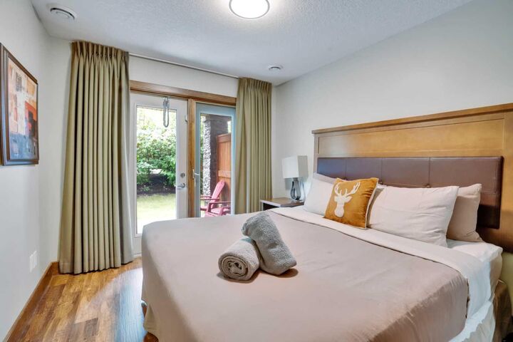 Property Photo: 121 Kananaskis Way 102 AB T1W 2X2