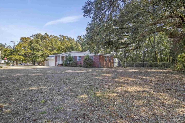 Property Photo:  6589 Cedar St  FL 32570 