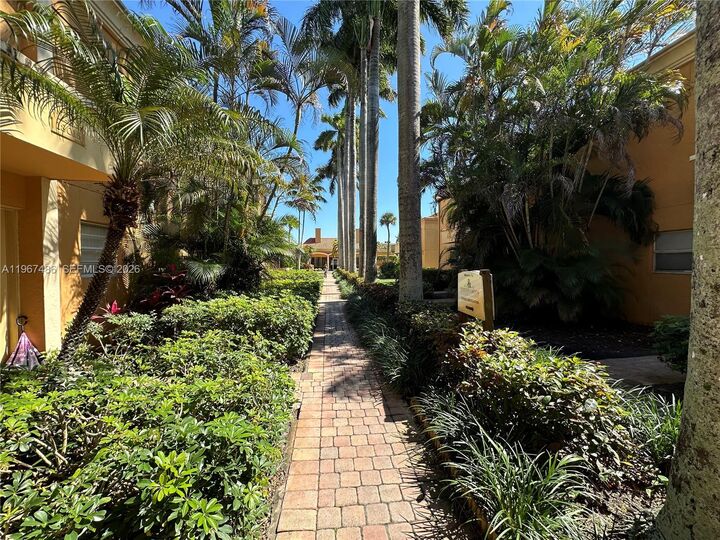 Property Photo:  18017 NW 68th Ave A-101  FL 33015 