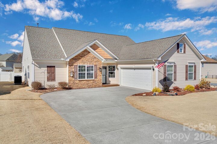 Property Photo:  4444 Bravery Place SW 116  NC 28027 