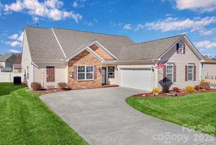 Property Photo:  4444 Bravery Place SW 116  NC 28027 