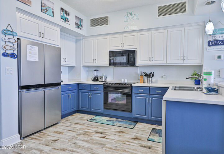 Property Photo:  8715 Surf Drive 2002B  FL 32408 