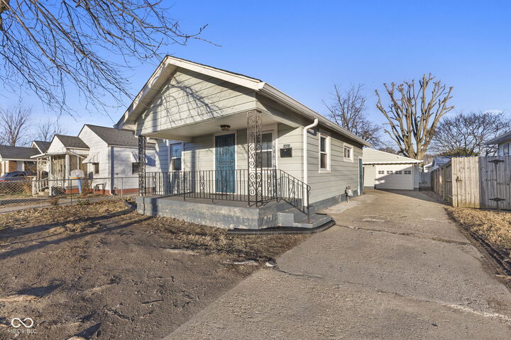 Property Photo:  1431 N Tibbs Avenue  IN 46222 