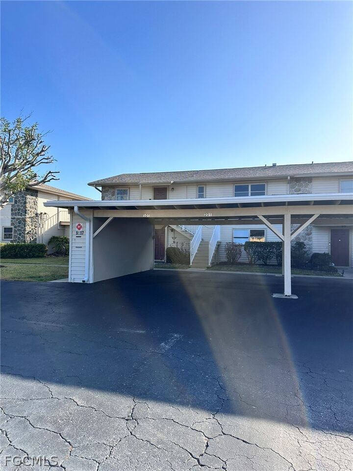 Property Photo: 5917 Littlestone Court 201 FL 33903