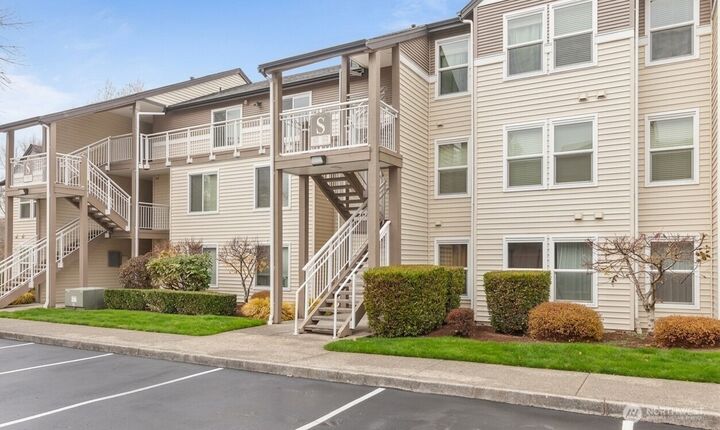 Property Photo:  12303  Harbour Pointe Boulevard S303  WA 98275 