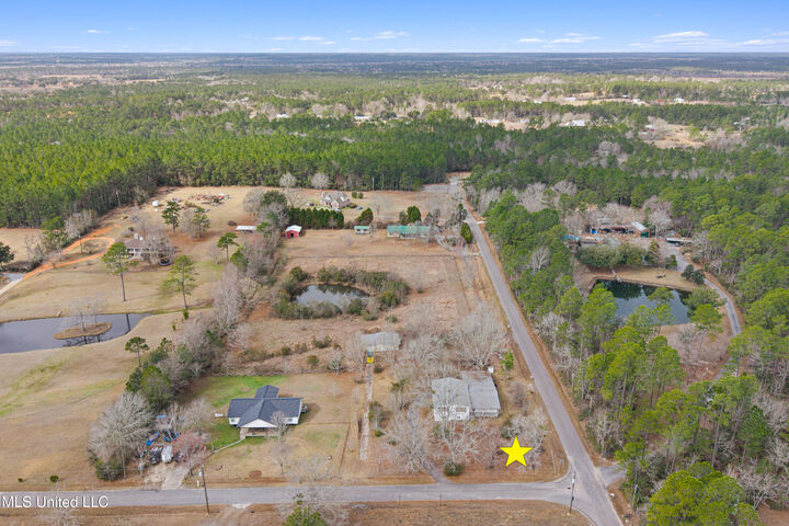 Property Photo:  21500 D Herde Road  MS 39503 