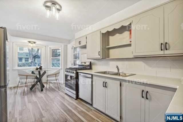 Property Photo:  5-08 Essex Place  NJ 07410 