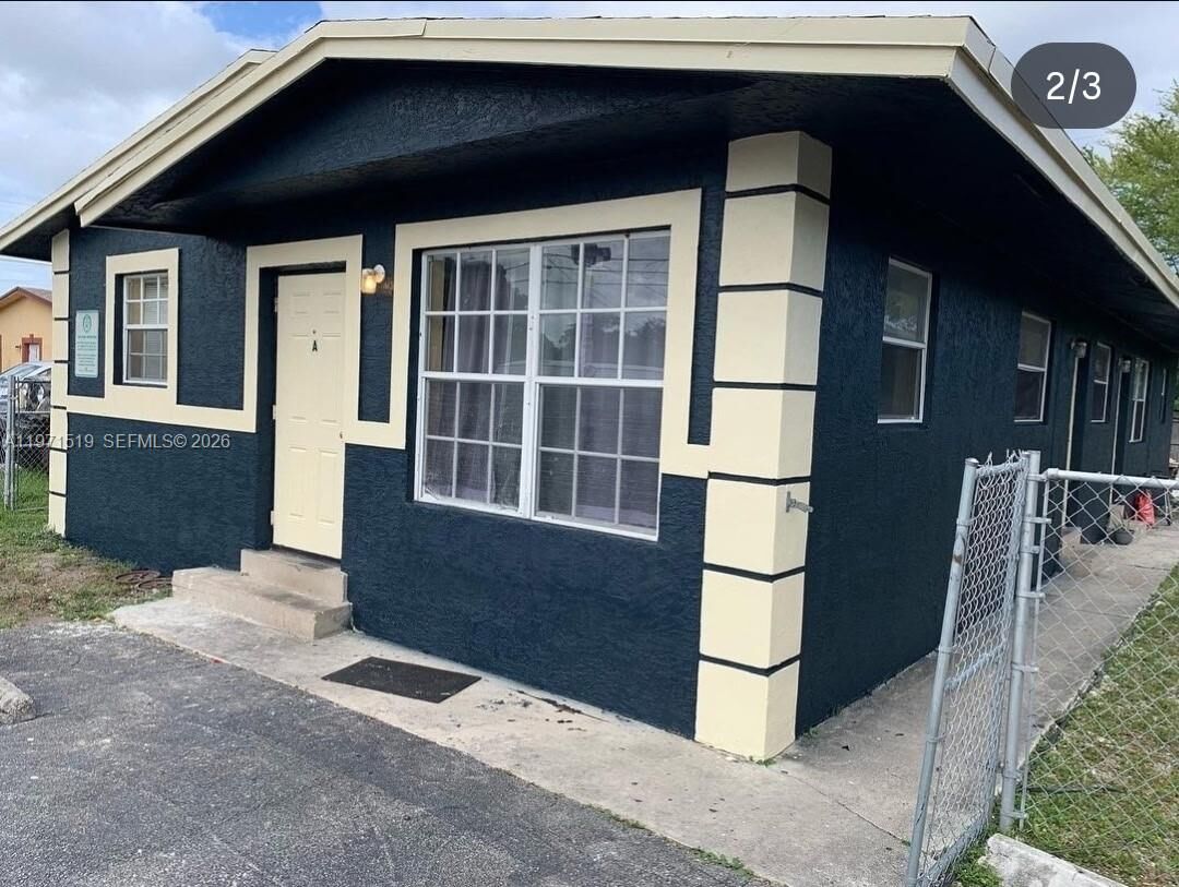 Property Photo:  770 SW 2nd Ave  FL 33441 