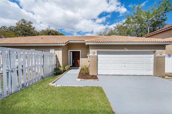 Property Photo:  210 SW 98th Ter  FL 33025 