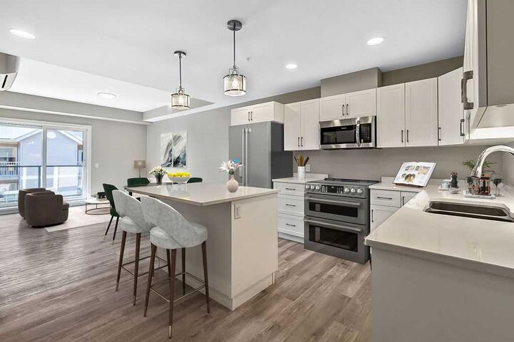 Property Photo: 97 Station Drive 201 AB T4S 0S6