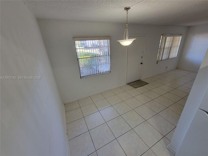 Property Photo:  300 SW 134th Way 113E  FL 33027 