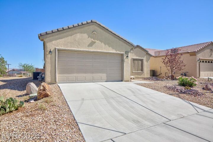 Property Photo:  7716 Homing Pigeon Street  NV 89084 