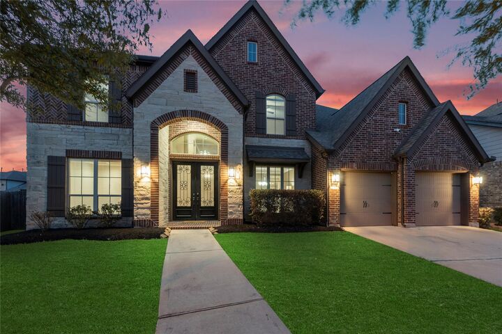 Property Photo: 10323 Millcreek Manor Lane TX 77433