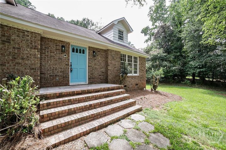 Property Photo:  215 Lenox Road  GA 30606 