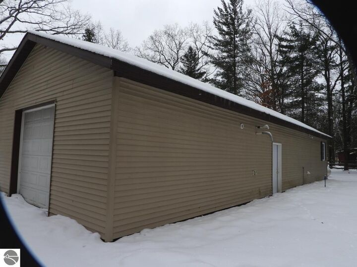 Property Photo:  7861 N Bass Lake Road  MI 49644 