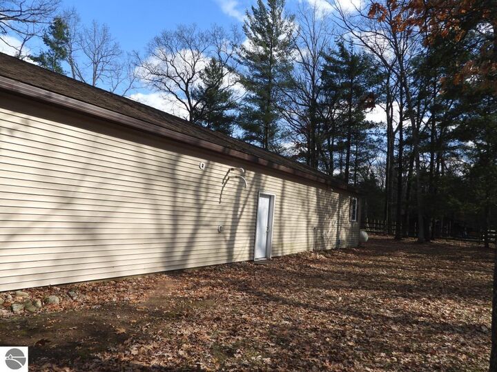 Property Photo:  7861 N Bass Lake Road  MI 49644 