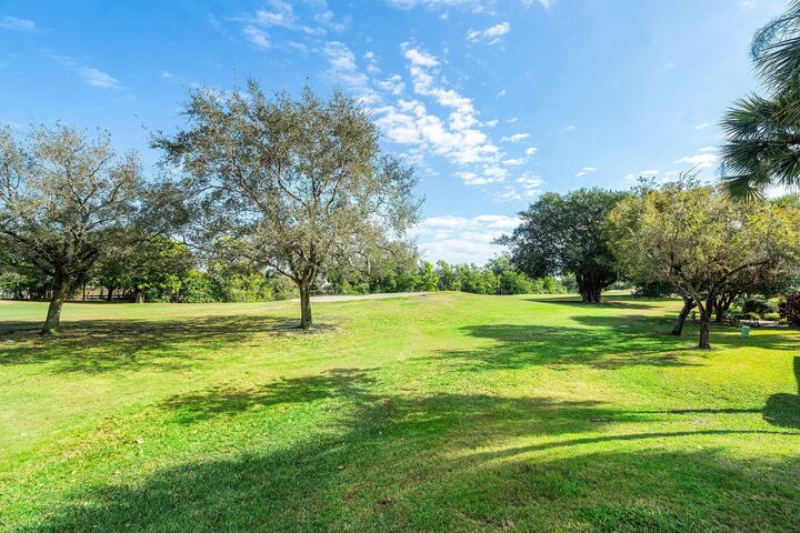 Property Photo:  11177 Aspen Glen Drive 206  FL 33437 