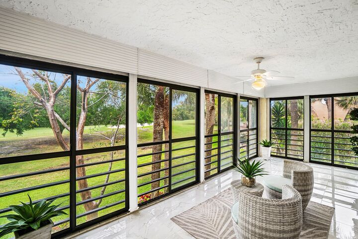 Property Photo:  11177 Aspen Glen Drive 206  FL 33437 