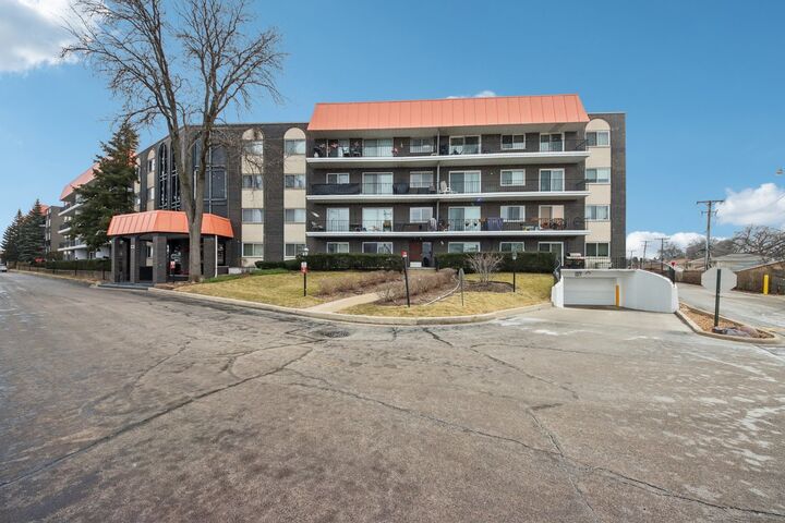 Property Photo:  4949 Golf Road 308  IL 60077 