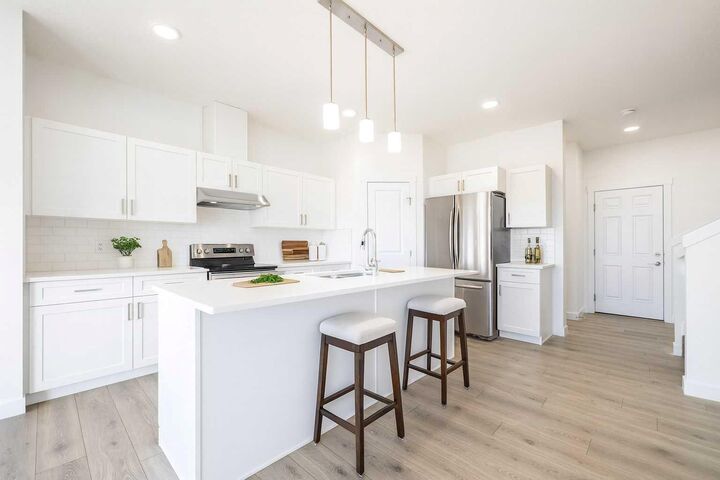 Property Photo: 308 Edgefield Close AB T1P 2H9