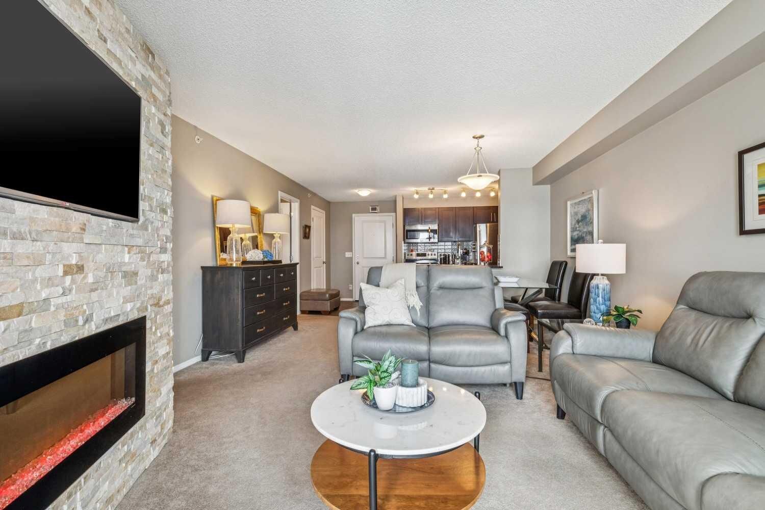 Property Photo: 403 Mackenzie Way SW 6409 AB T4B 3V7