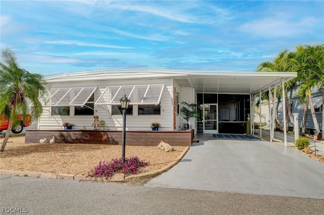 Property Photo:  5554 Sir Walter Way  FL 33917 