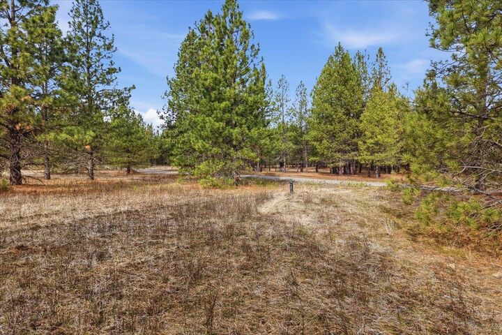 Property Photo:  65xx Whispering Pines Way Lot #2  WA 99026 