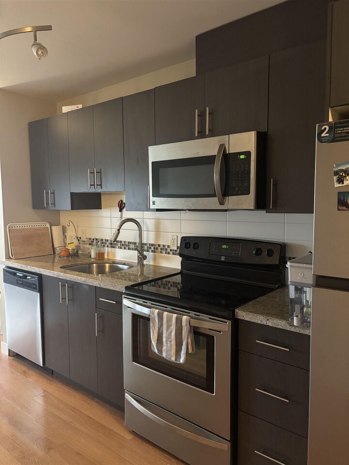 Property Photo: 7738 Edmonds Street 305 BC V3N 1B8