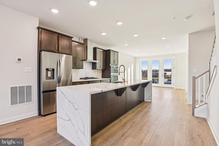 Property Photo:  17314 Hardisty Way 7E  MD 20715 