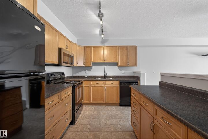 Property Photo:  1589 Glastonbury Boulevard NW 102  AB T5T 2V1 