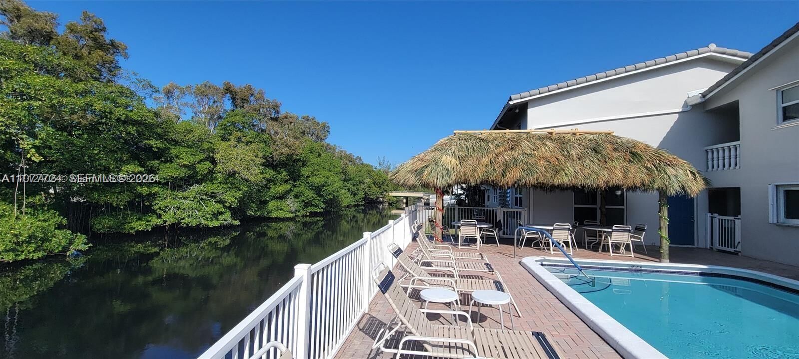 Property Photo:  1400 NE 55th St 201  FL 33334 