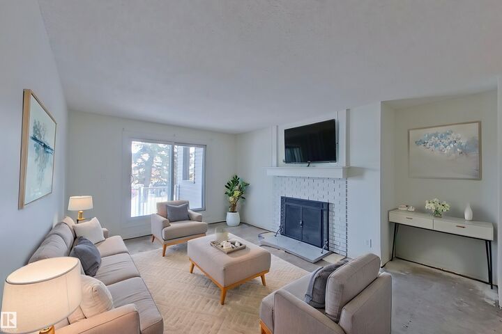 Property Photo:  6208 180 Street NW 107  AB T5T 2T2 