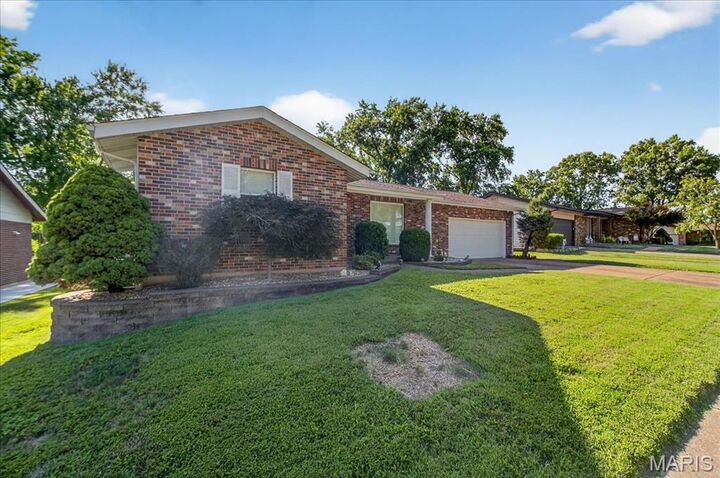 Property Photo:  5709 Chatport Road  MO 63129 