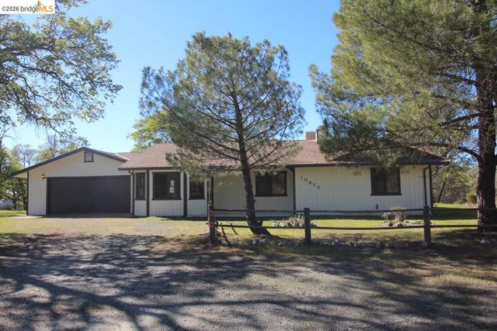 Property Photo:  10477 Violetta  CA 95311 