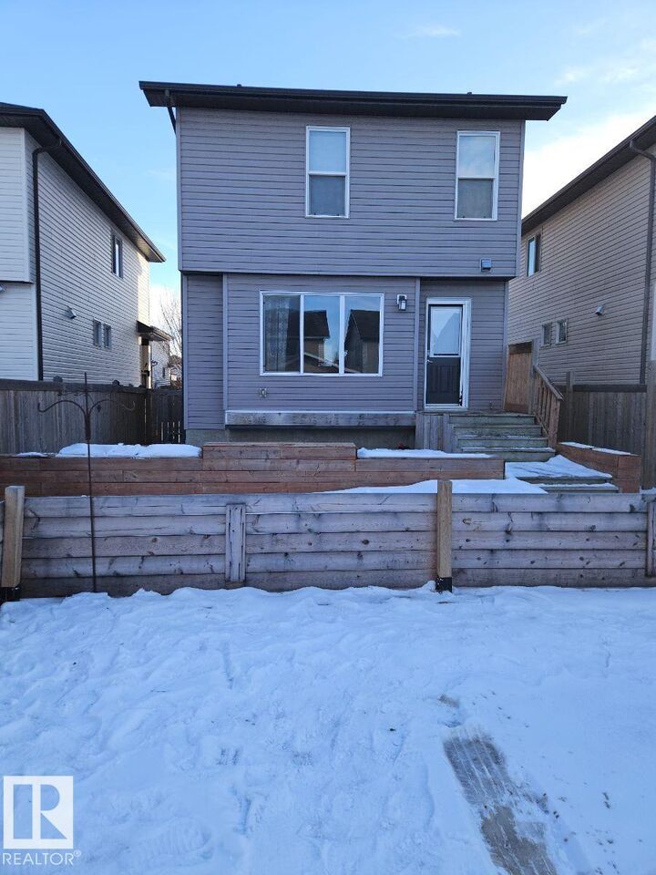Property Photo: 208 Kirpatrick Way AB T9E 1B5