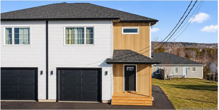 Property Photo: 203 Teaberry Avenue NB E1G 0E8