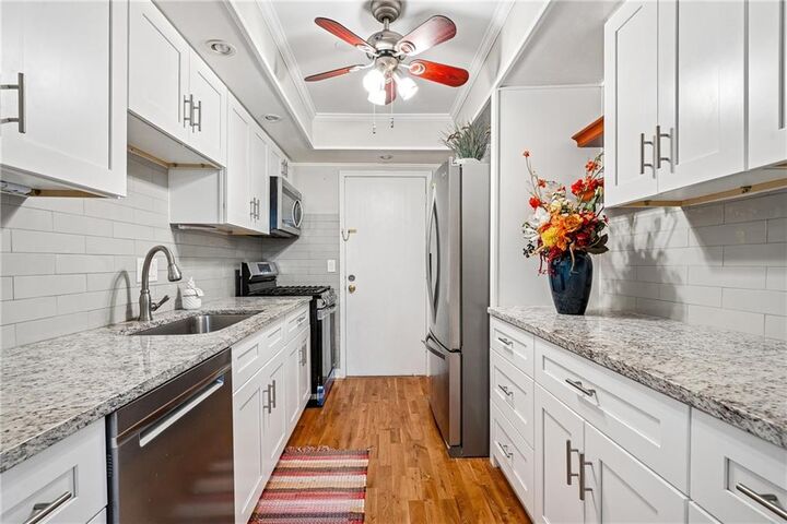 Property Photo:  6851 Roswell Road F32  GA 30328 